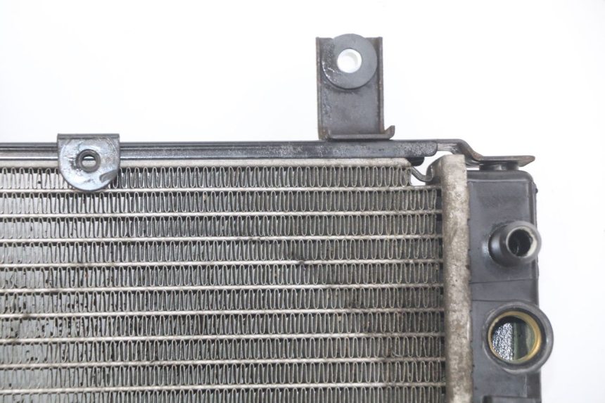 photo de CHŁODNICA SYM GTS EFI 125 (2012 - 2016) - Stan powierzchni