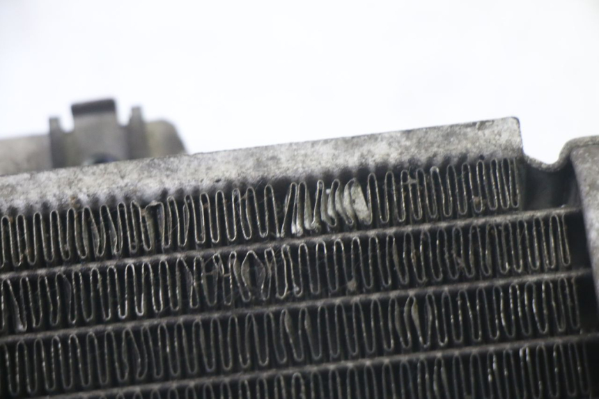 photo de CHŁODNICA PIAGGIO MP3 125 (2006 - 2014) - Zoom stanu zużycia