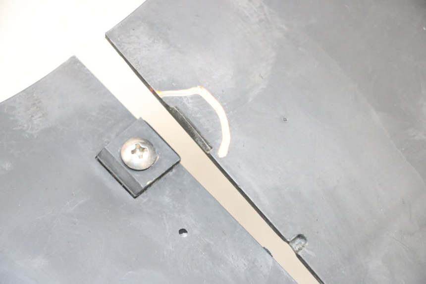 photo de OSŁONA SILNIKA DAELIM VJ ROADWIN FI 125 (2008 - 2017) - Zoom stanu zużycia